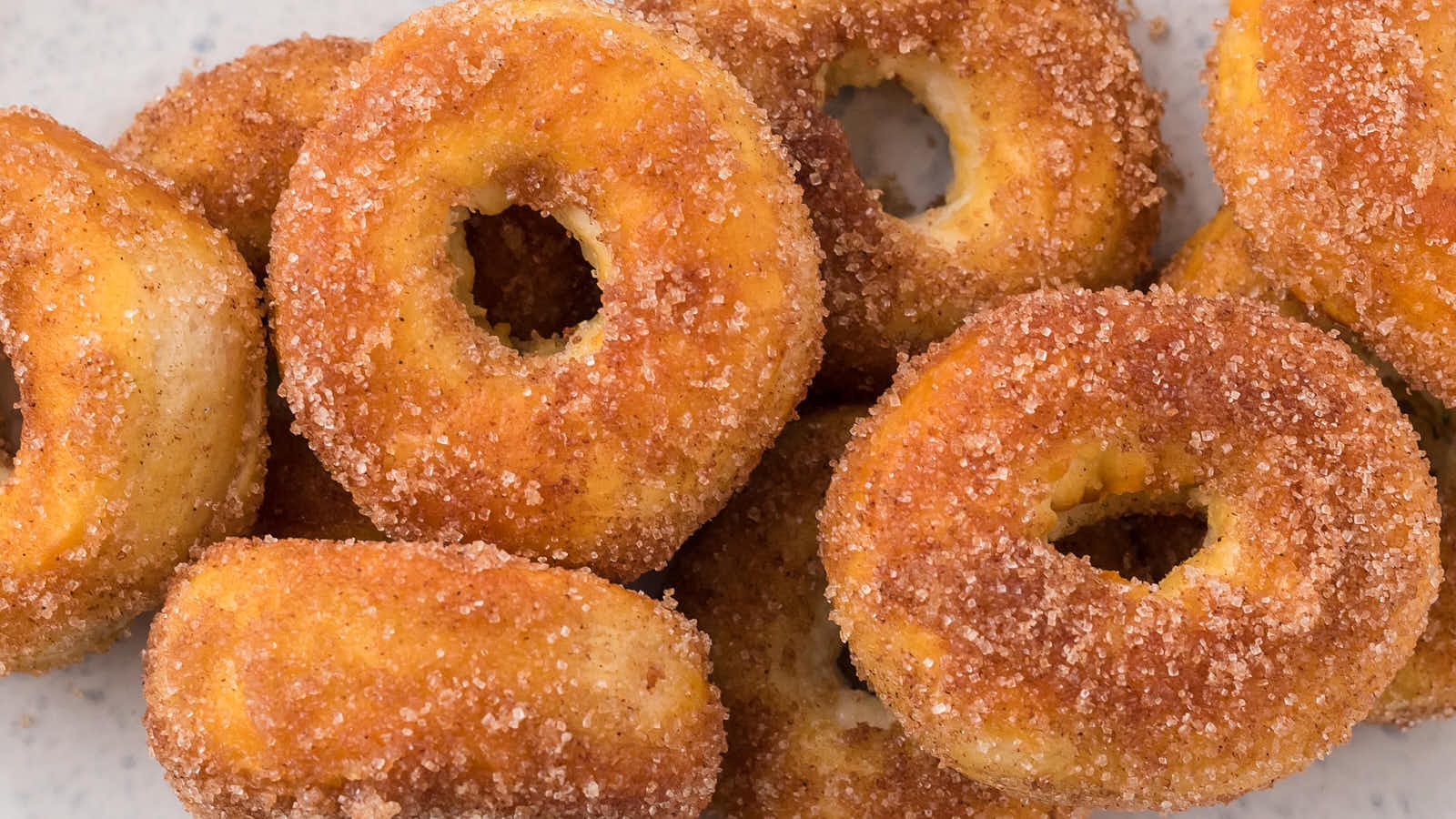 Easy Air Fryer Donuts Dipped In Cinnamon Sugar