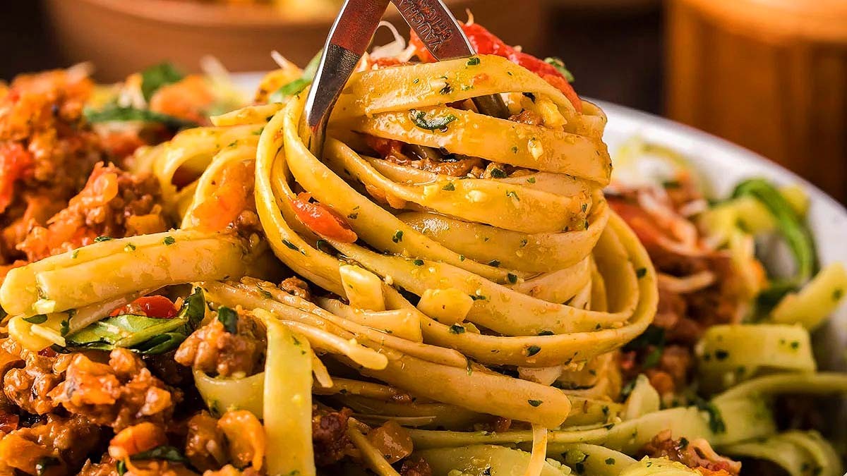 Pesto Fettuccini With Bolognese Sauce