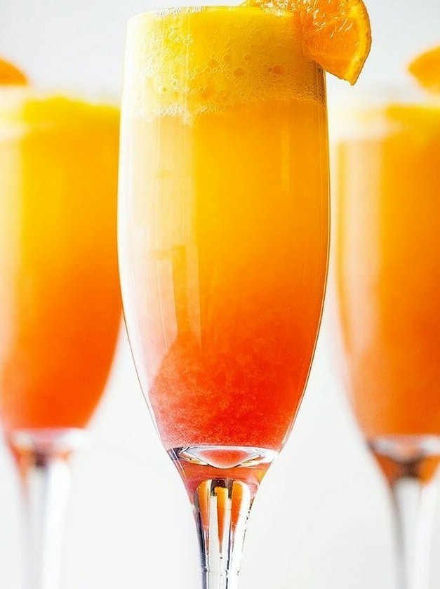 Mango Mimosa Spritz with Pomegranate Kiss