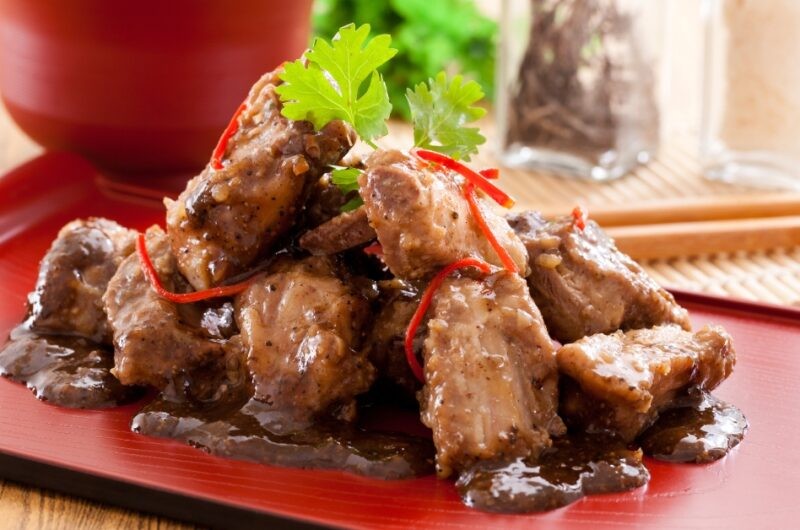 Pork Chop Salad With Dried Cranberries, Nuts, and Caesar Dressing