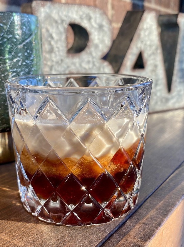 Amaretto White Russian with Orange Twist