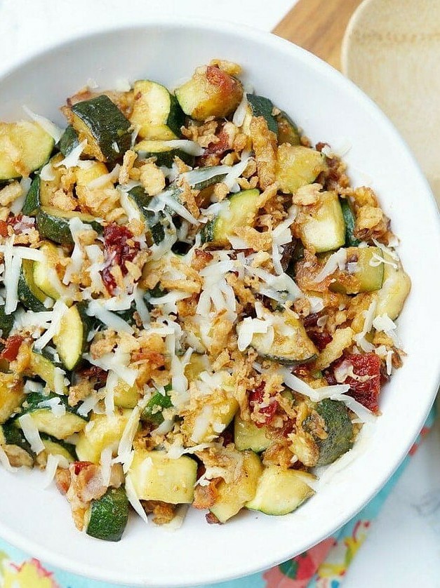 Zucchini with Sun Dried Tomatoes, Bacon, and Crispy Onions