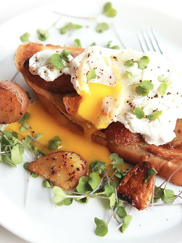 Eggs Poached Over Crispy Roasted Potatoes