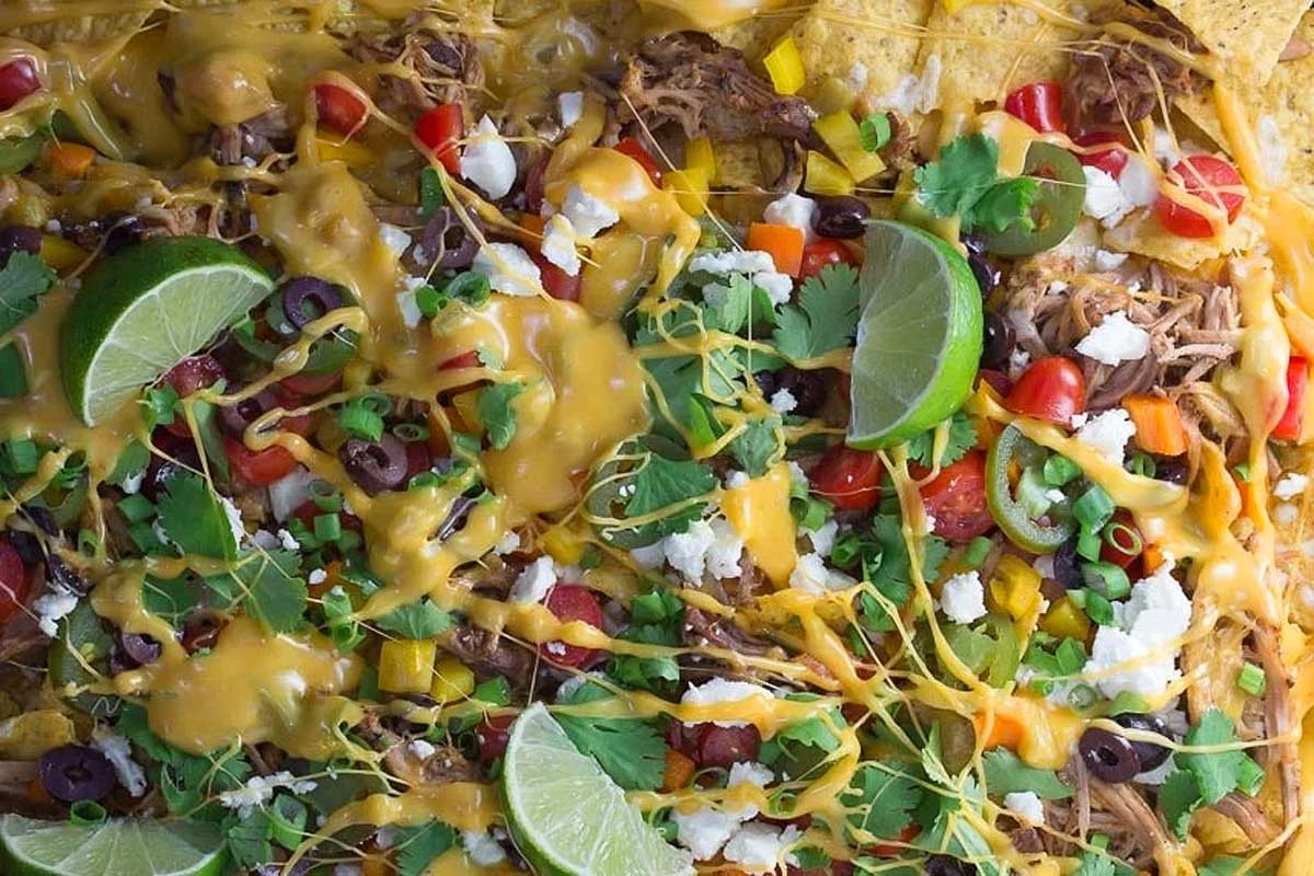 Beer Cheese Nachos with Shredded Pork Delight