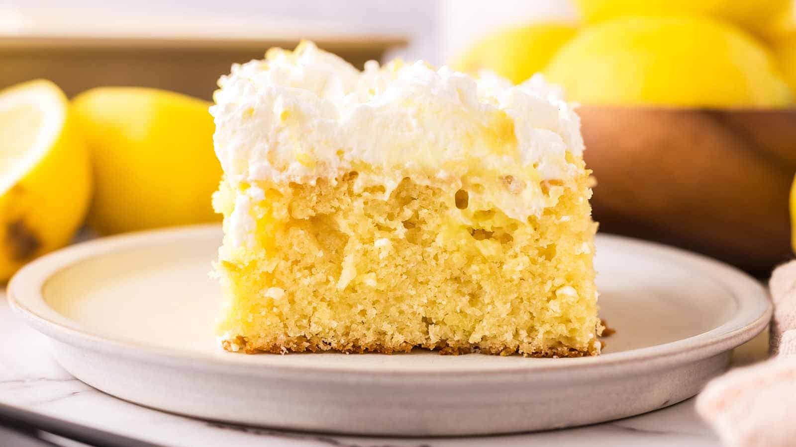 Tangy Lemon Pudding Poke Cake Delight