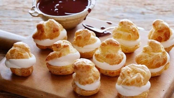 Chocolate-Soaked Cream Puffs for a Luxurious Touch