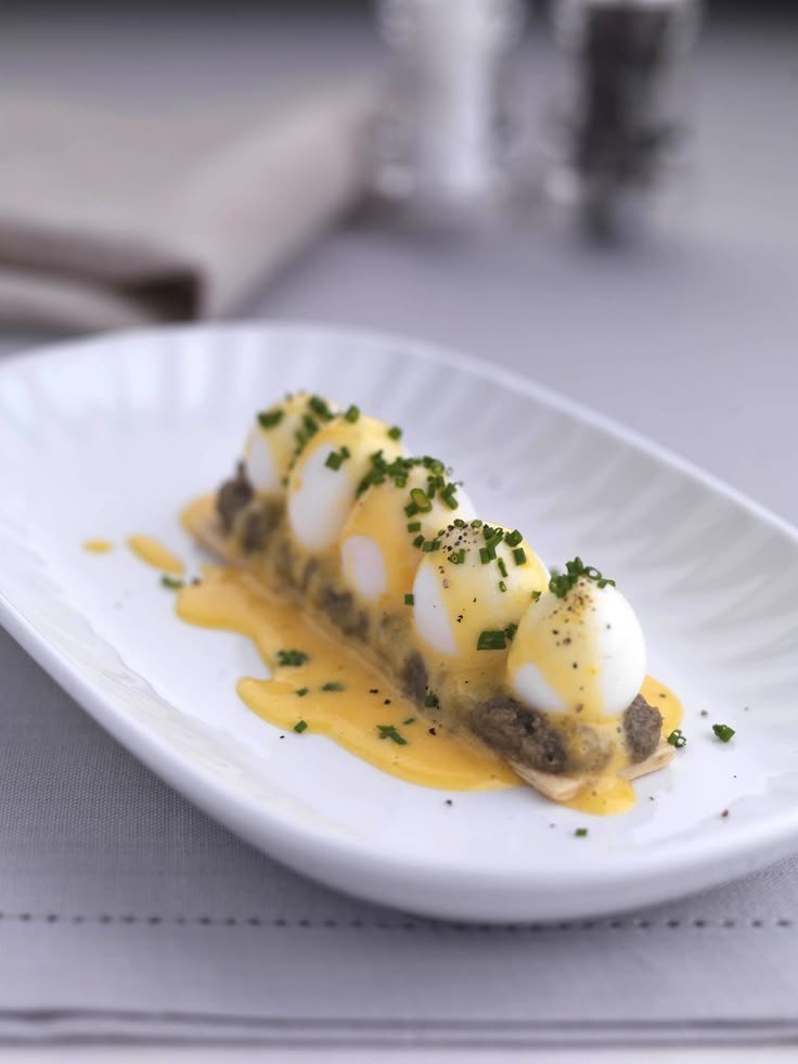 Quail Egg Feuilleté with Rich Hollandaise Topping