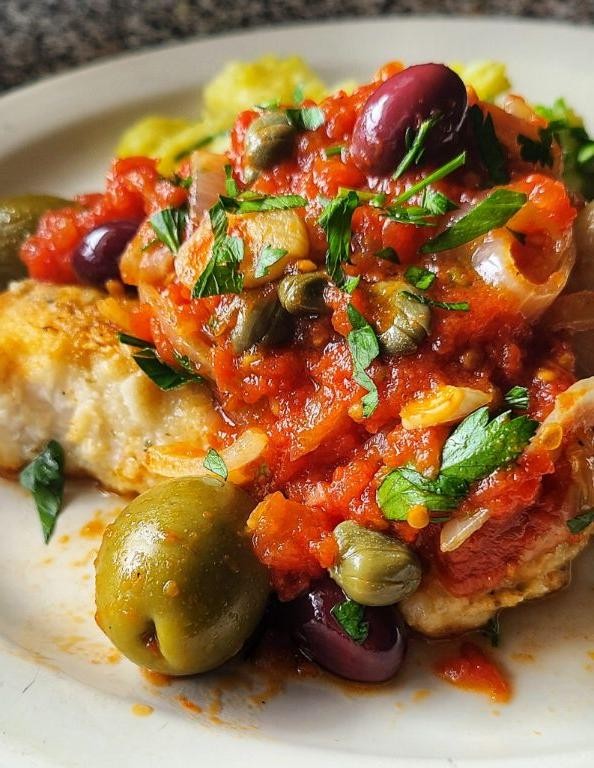 Basa Fish in Tomato and Olive Sauce