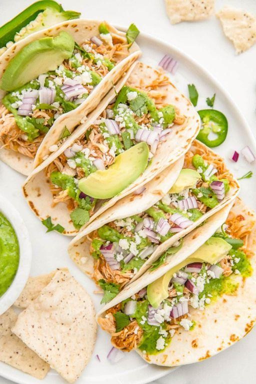 Creamy Crockpot Chicken Tacos with Avocado Lime Sauce