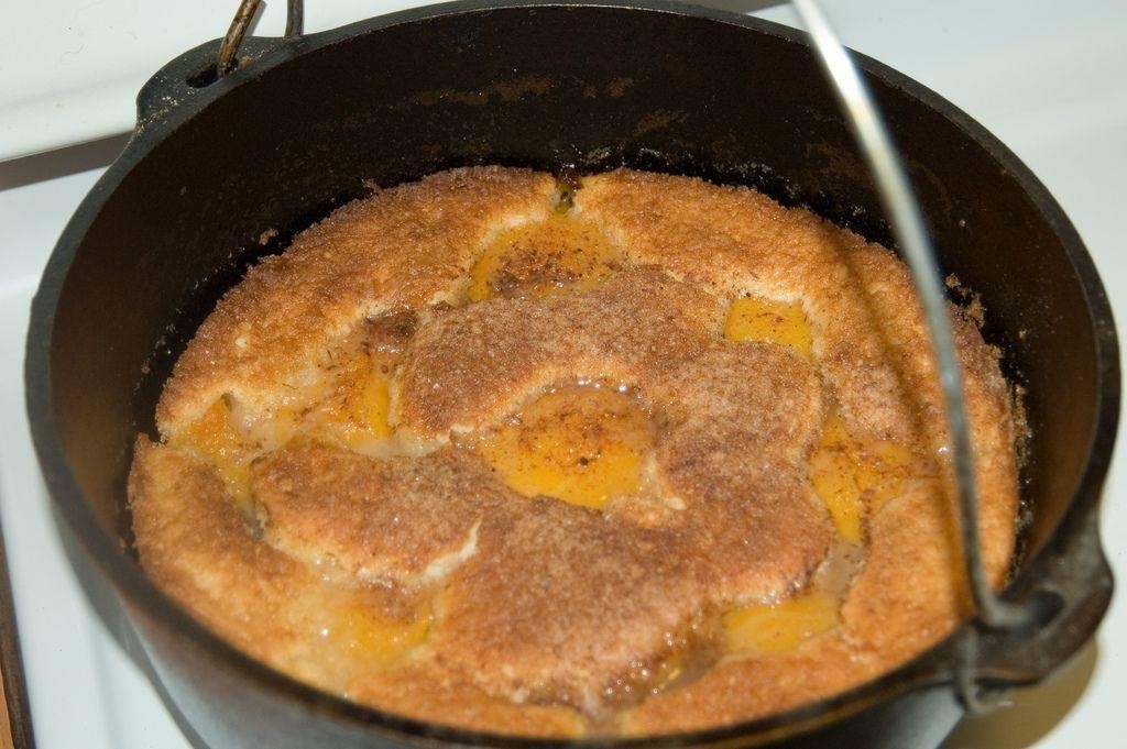 Dutch Oven Peach Dump Cake on the Grill