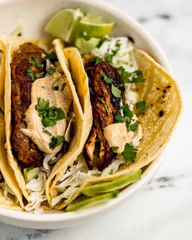 Jerk Chicken Thigh Tacos with Cilantro Lime Sauce