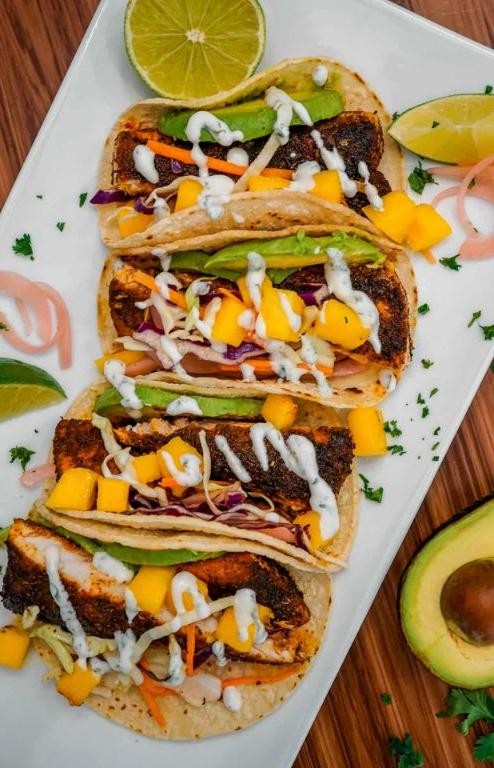 Spicy Pacific Halibut Tacos with Mango Slaw