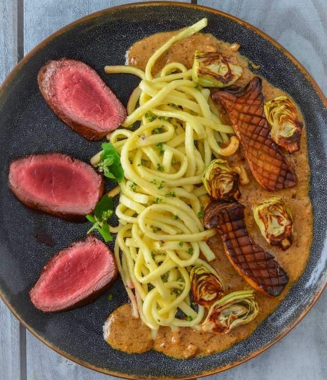 Wild Hog Backstrap with Bourbon Mushroom Sauce