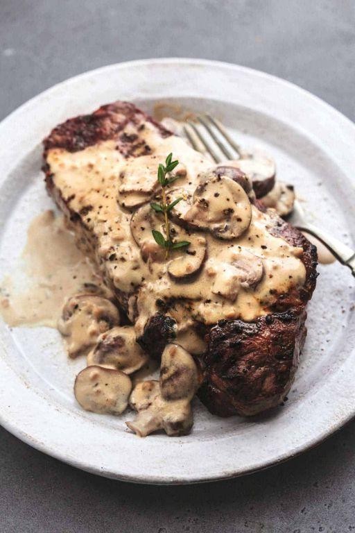 Grilled Ribeye with Creamy Mushroom Sauce
